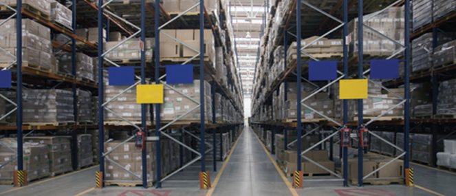 Shows view of shelving containing assets in large warehouse